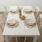 Halfa Flower-Shaped Placemat used in dining table setup with pink placemats, plates, and floral vase arrangement