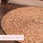 Halfa oval welcome mat round woven design on wooden floor with durability text overlay