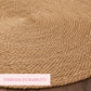 Close-up of a woven rope rug with 'Timeless Durability' text overlay.