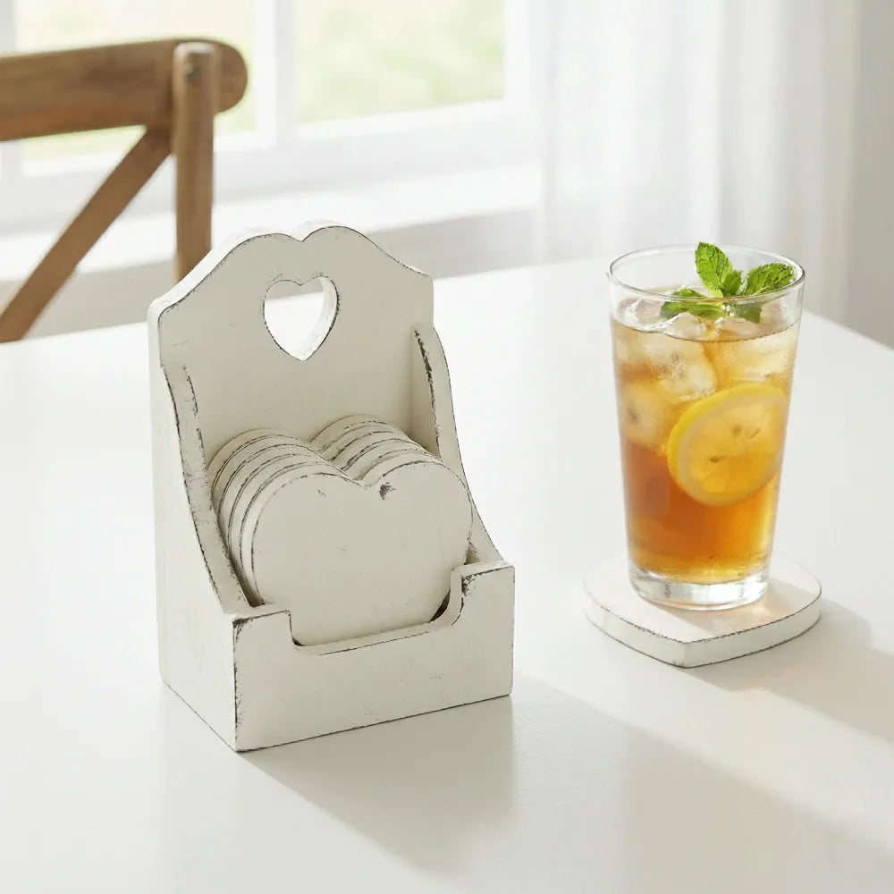 Heart-Shaped Coasters with Wooden Holder set in distressed finish beside iced tea glass on white table