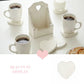 Heart-Shaped Coasters with Wooden Holder set featuring three white mugs and milk jar on display for home decor