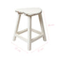 Distressed white heart-shaped wooden stool with dimensions 37 cm by 37 cm and a height of 48 cm on a white background.