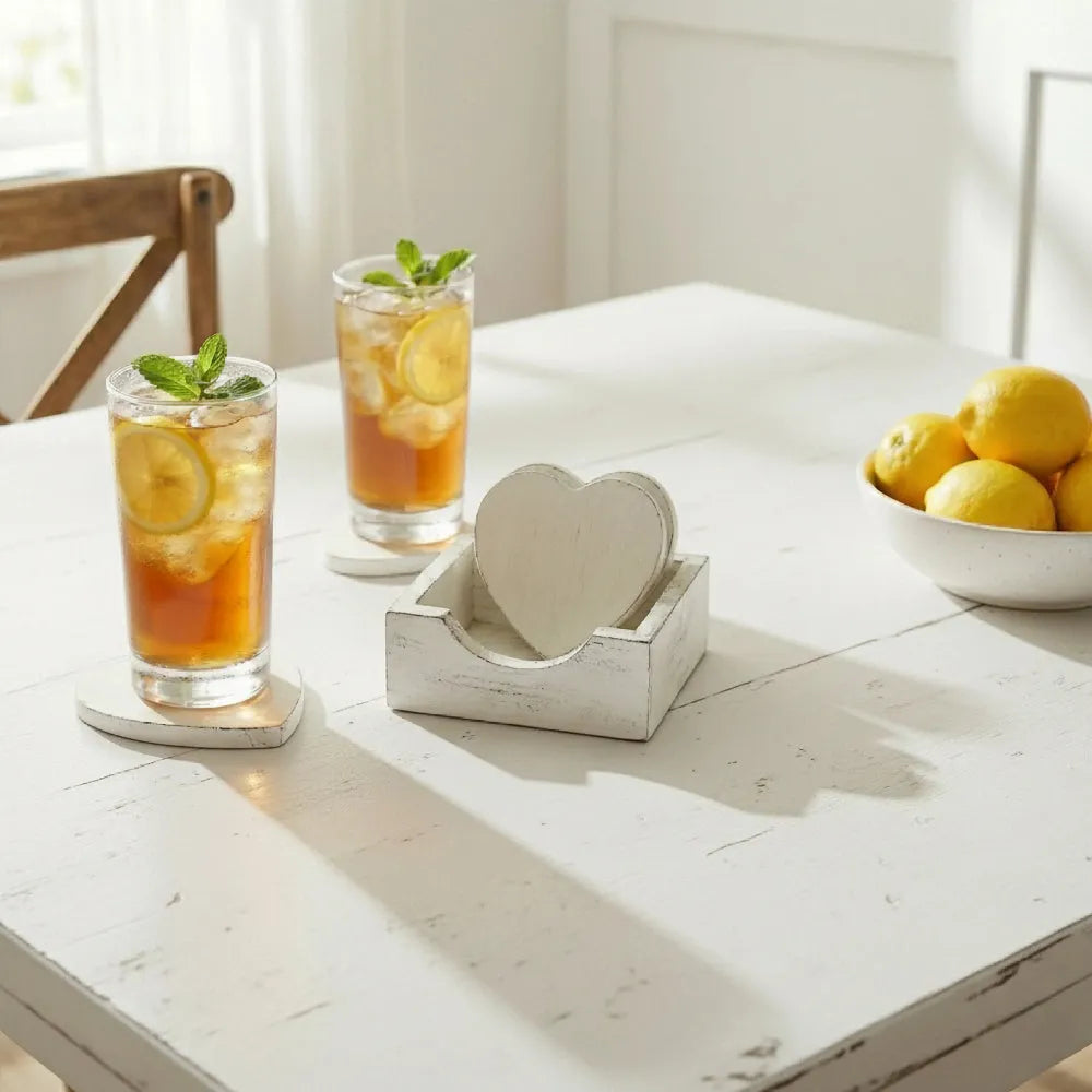 Heart-Shaped Coasters with Wooden Holder placed on white wooden table with iced tea glasses and lemon slices