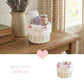 Mini Tube Wicker Basket with decorative items displayed on wooden surface and Beauty in Display text for home decor styling