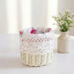 Mini Tube Wicker Basket white woven storage basket with floral fabric liner on light surface blurred background home decor