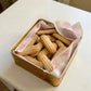 Box of nashader cookies on a white surface