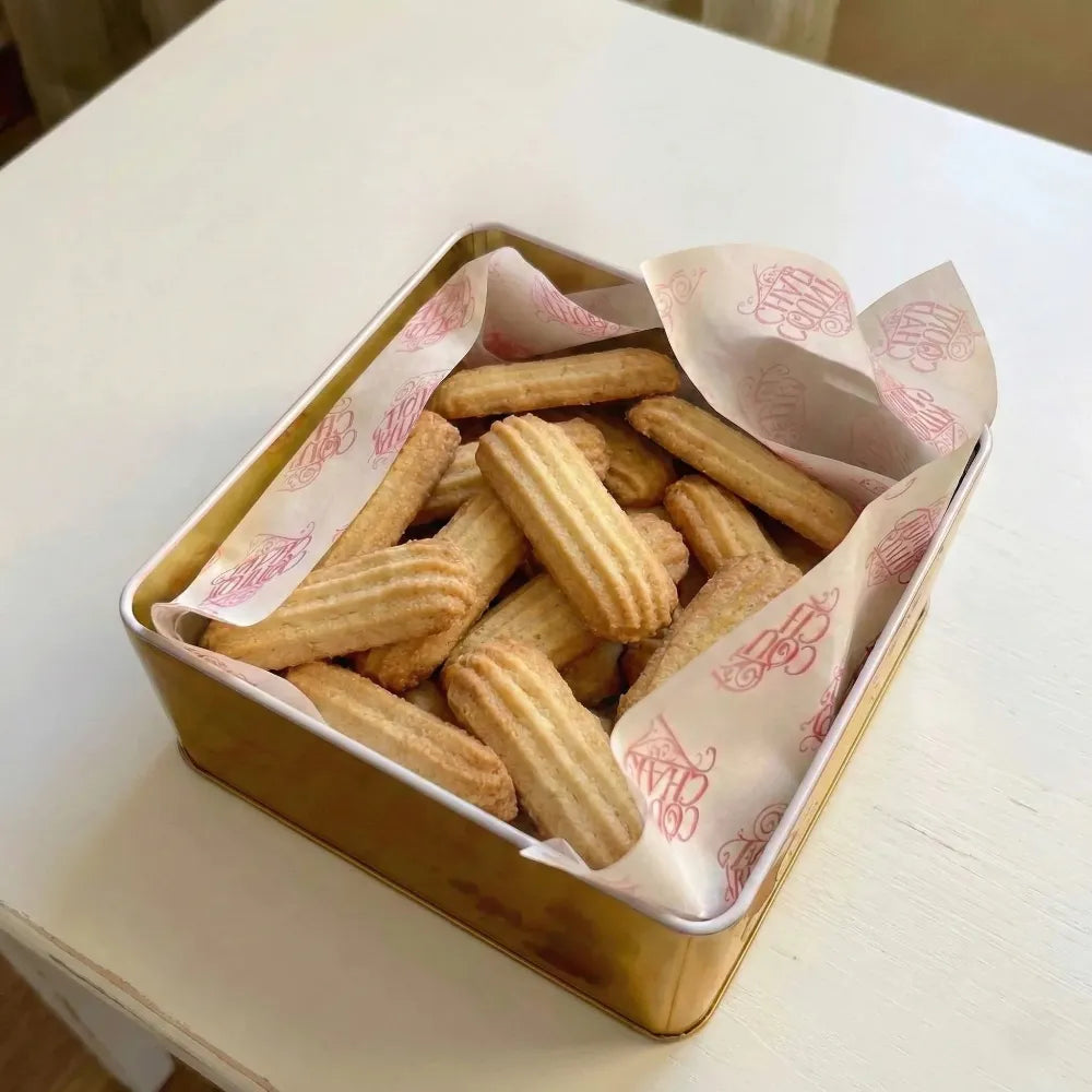 Box of nashader cookies on a white surface