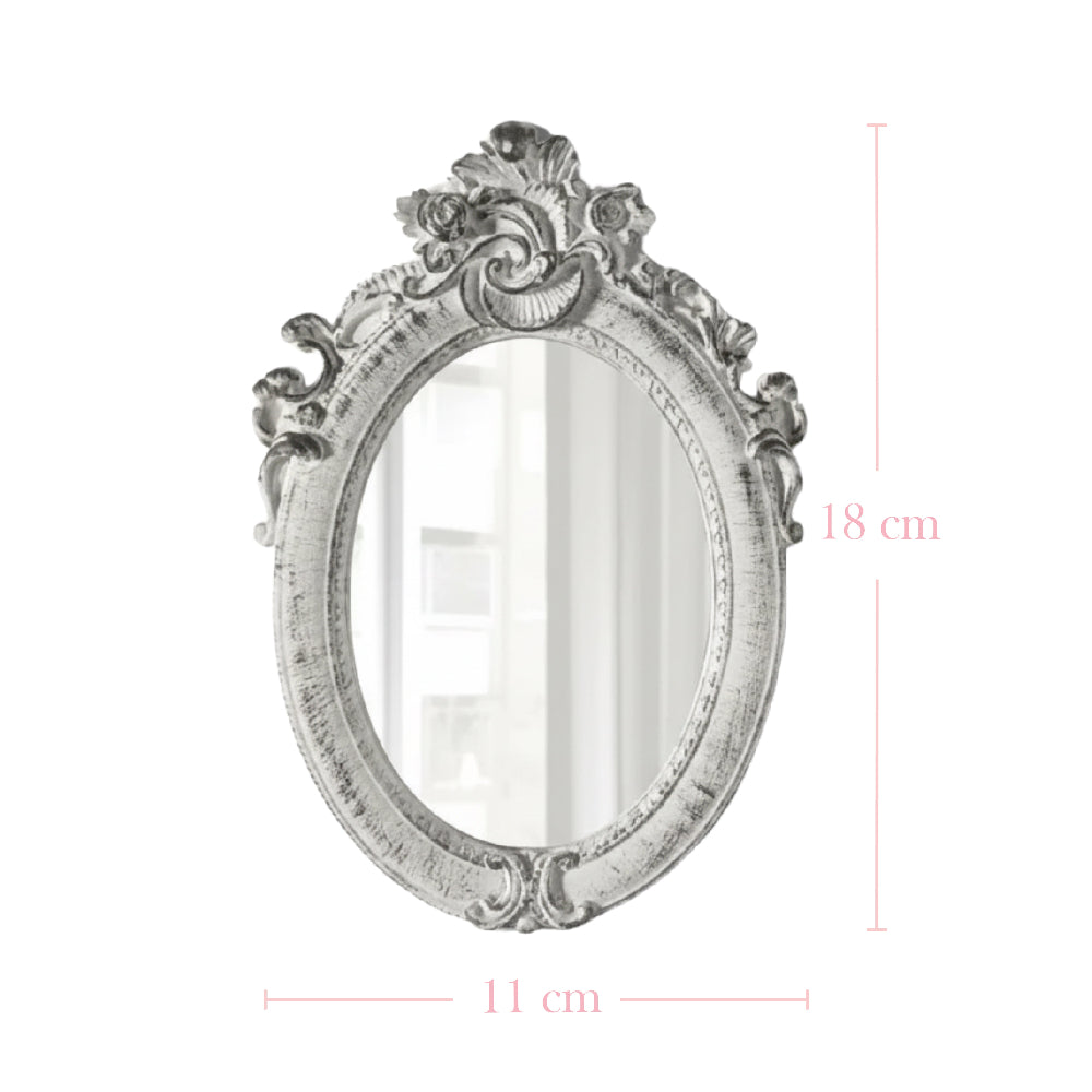 Ornate white oval mirror with dimension lines showing 18 cm height and 11 cm width on a plain white background.