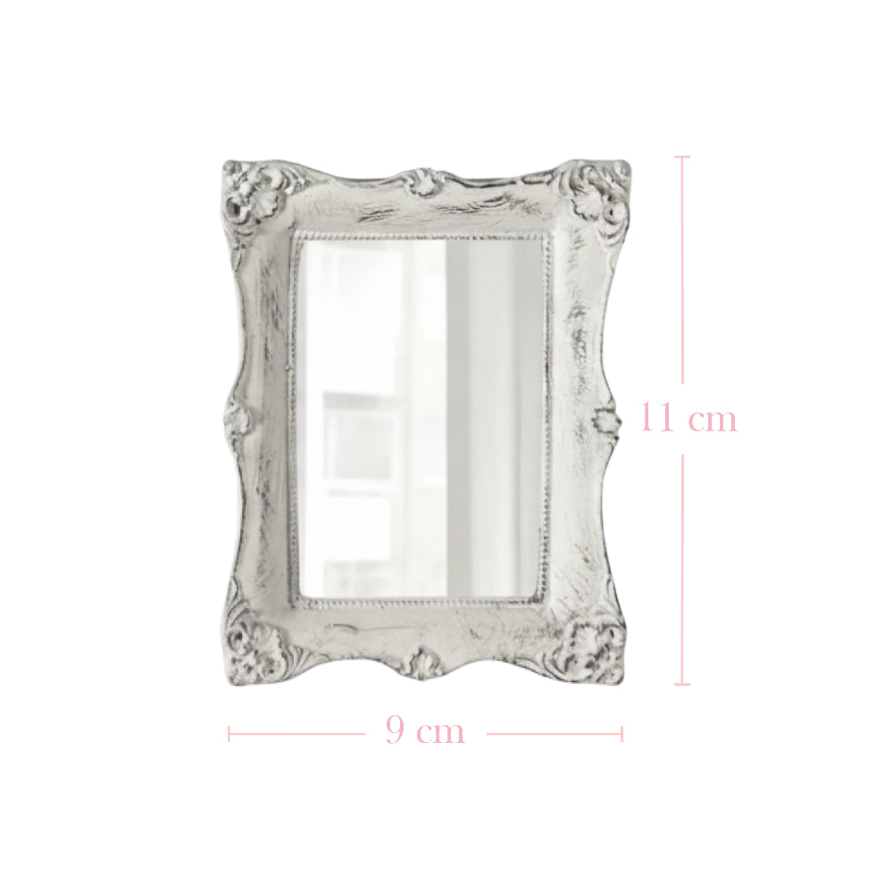 Ornate white rectangular mirror with dimension lines showing 11 cm height and 9 cm width on a white background.