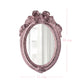 Small pink oval mirror with ornate floral carvings and dimensions indicating 18 cm height and 11 cm width.