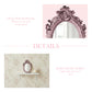 Product details graphic showing a pink ornate mirror on a shelf against floral wallpaper with descriptive text.