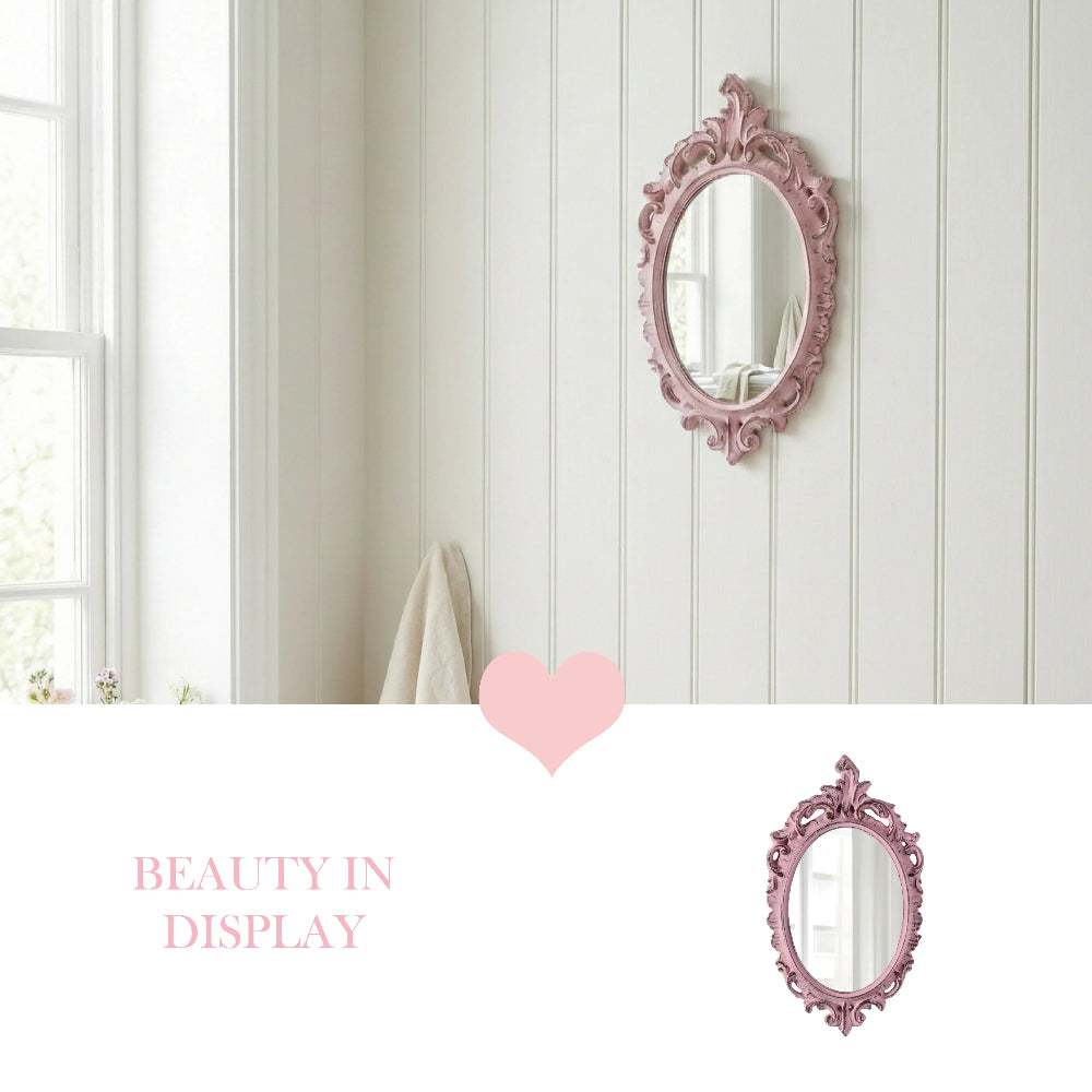Pink ornate oval mirror on a white shiplap wall next to a window, with a pink heart graphic and text at the bottom.
