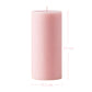 Pink pillar candle shown with dimension lines indicating a height of 15 cm and a width of 6.5 cm.