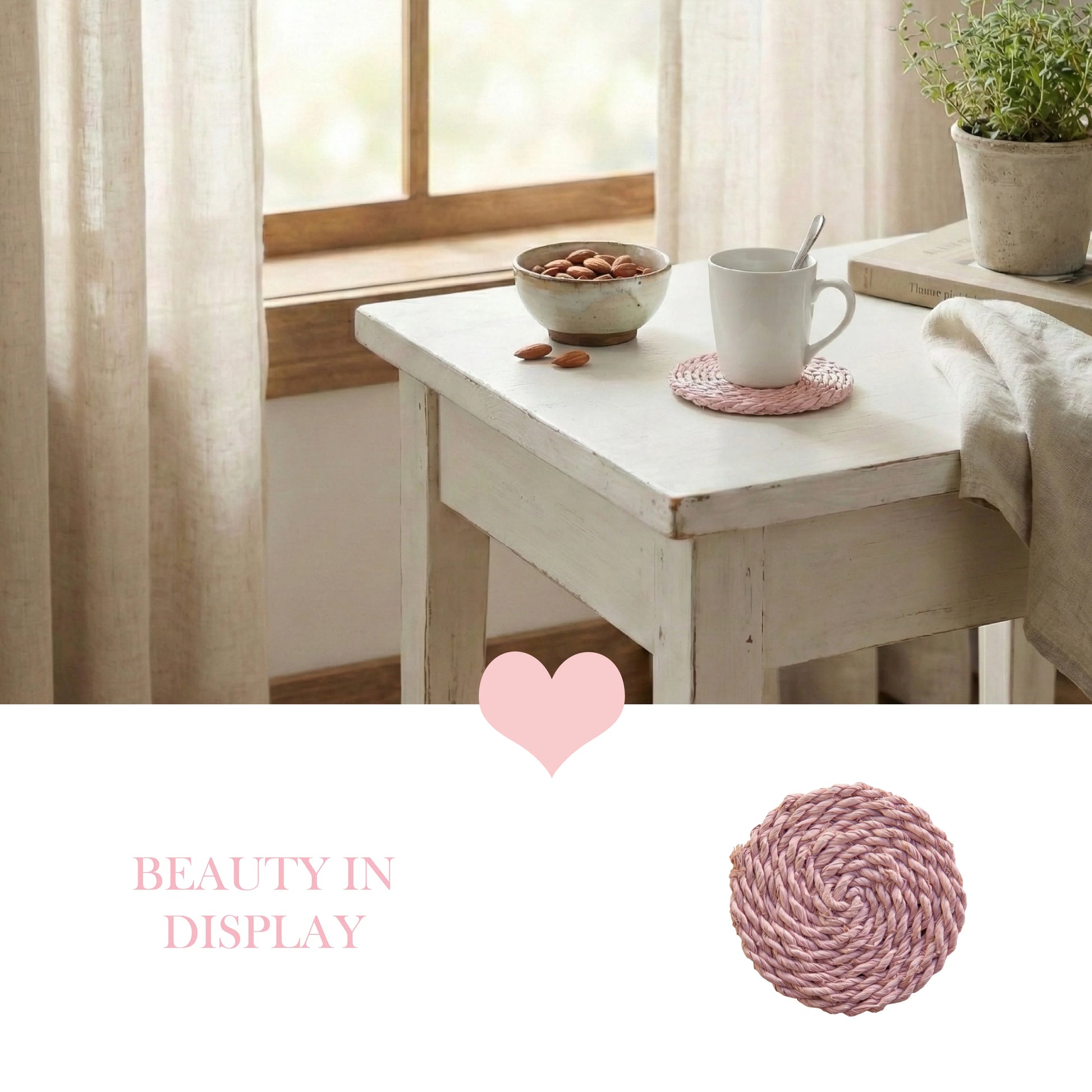 Pink round woven coaster under a white mug on a distressed white side table with a bowl of nuts and a potted plant.