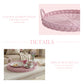 Pink woven tray with tea set on a table, sofa in the background, Infographic