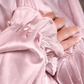 Close-up view of pink polka dot satin Isdal