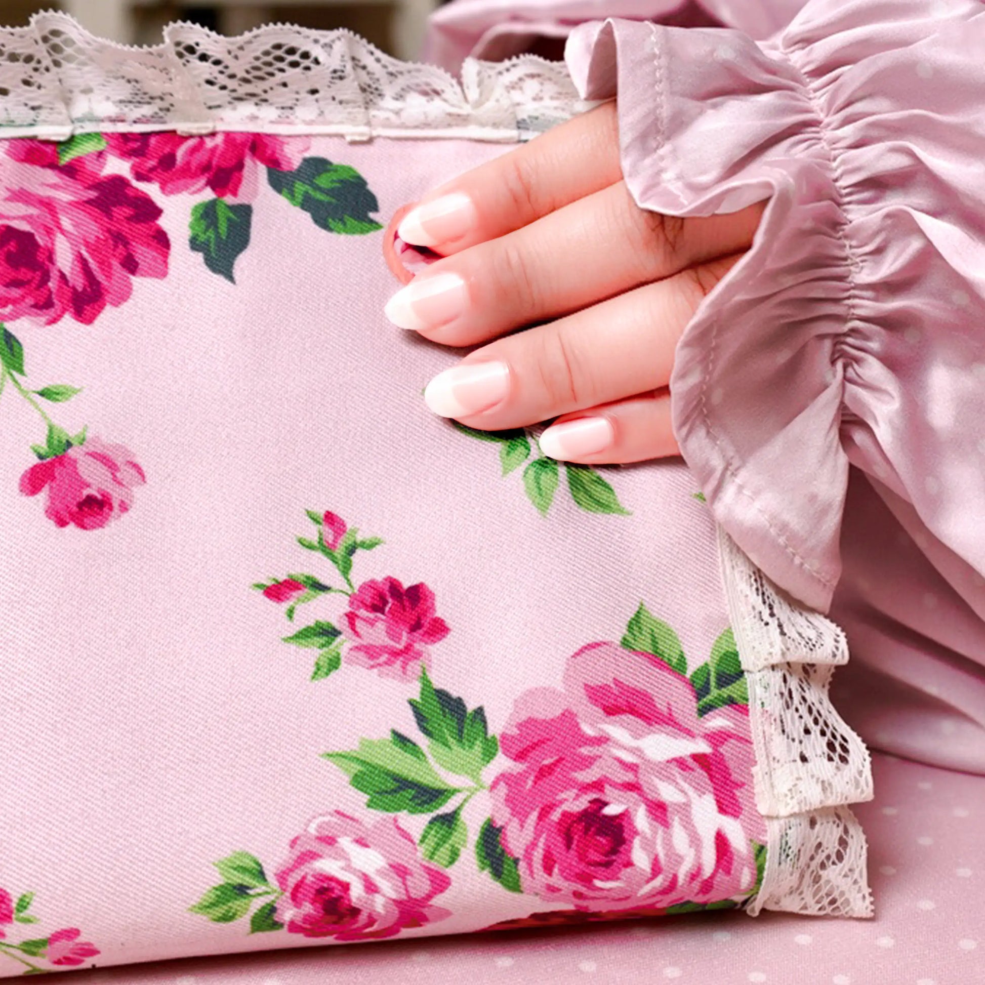 Women wearing Armenian satin pink polka dot isdal holding quran 
