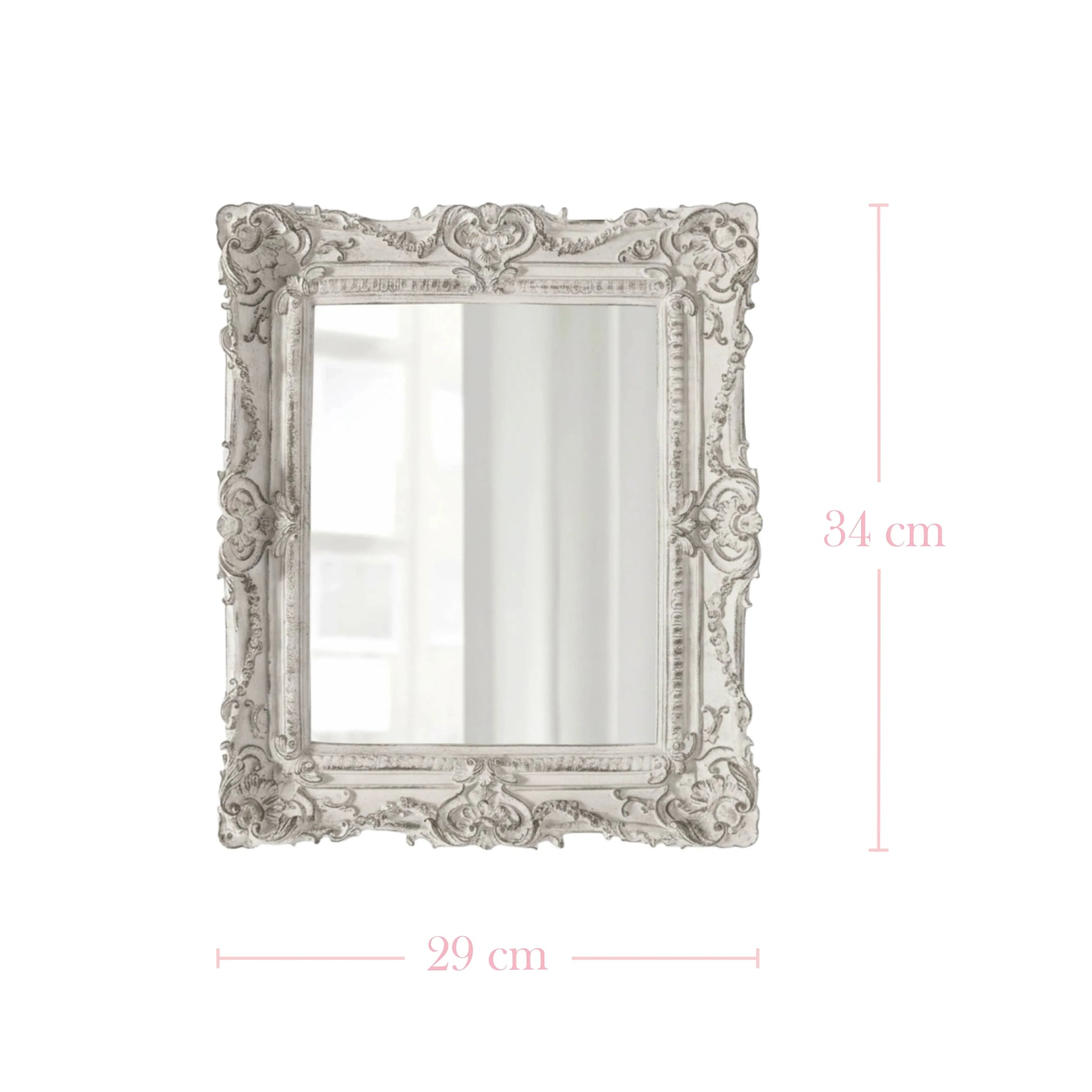 Decorative mirror with ornate frame and dimensions on a white background