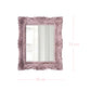 Decorative pink mirror with intricate details and dimensions on a white background