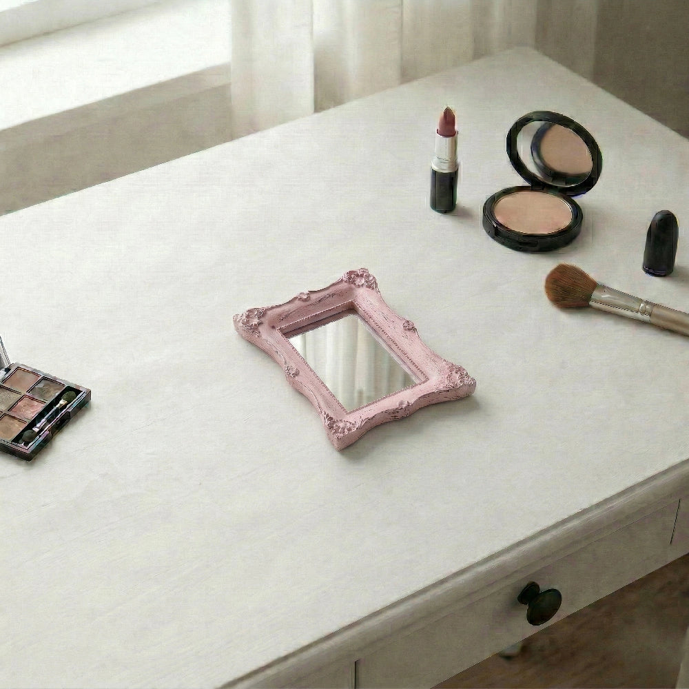 Pretty Shabby Wall Mirror Rectangular Chic with makeup items including lipstick and brushes on white surface