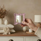 Pretty Shabby Wall Mirror Square Chic held in hand showcasing compact design