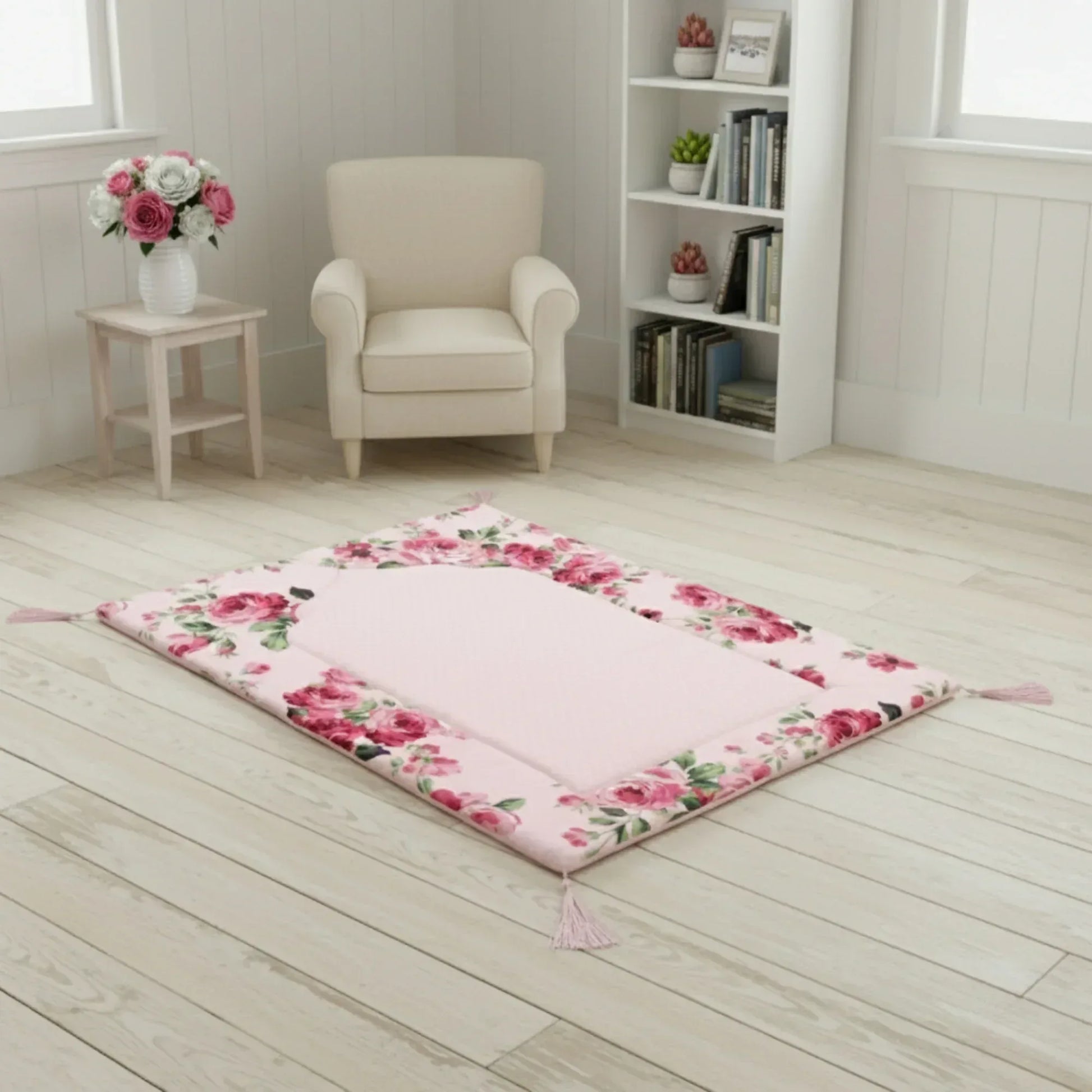 Floral-patterned rug on a wooden floor with a chair and bookshelf in the background.