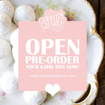 Pink pre-order sign for Country Charm on a decorative plate with cookies