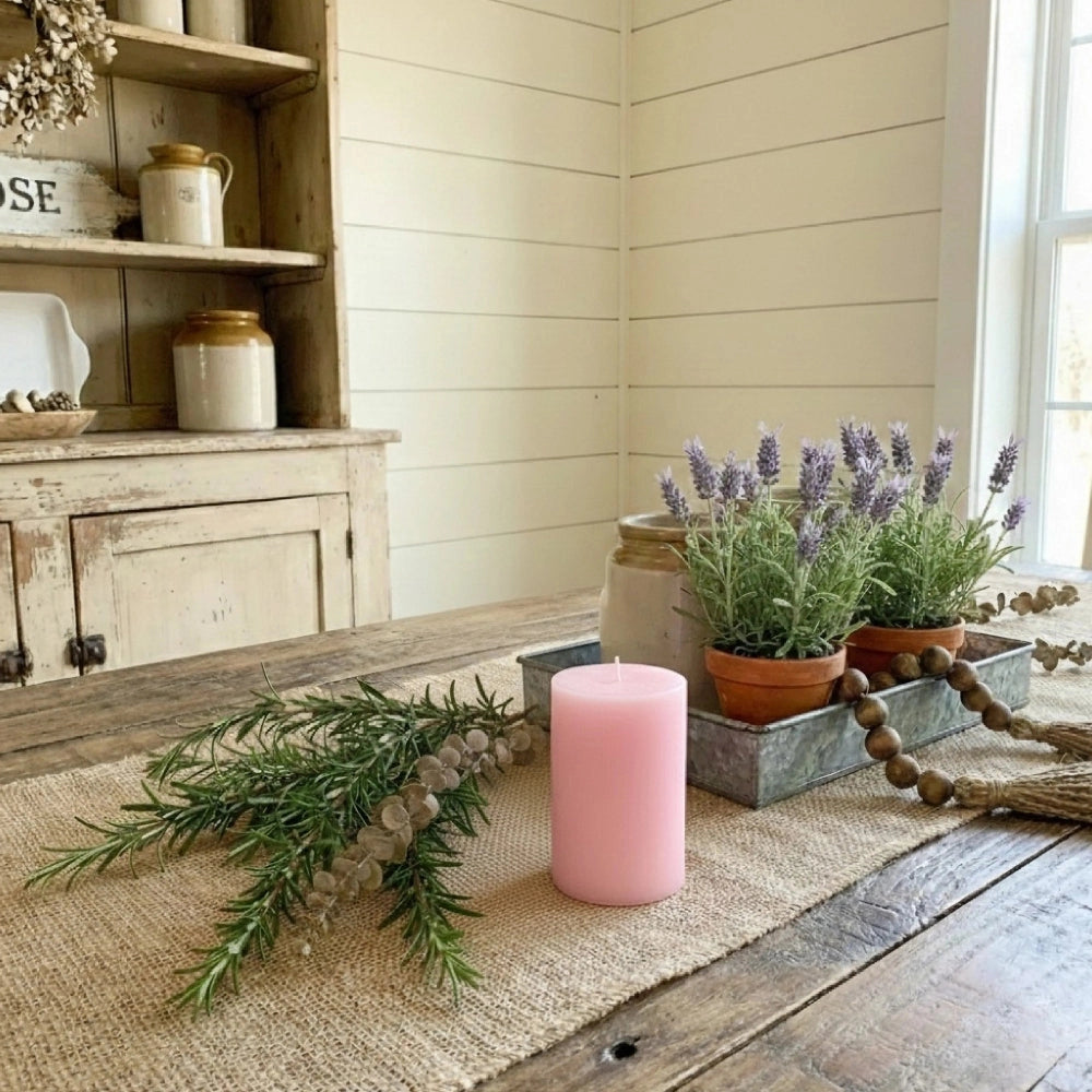 Rose Pillar Candle displayed with lavender plants on a burlap runner in a farmhouse dining setting