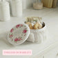 Rosie Tin Jar floral cookie tin with durability details on white background