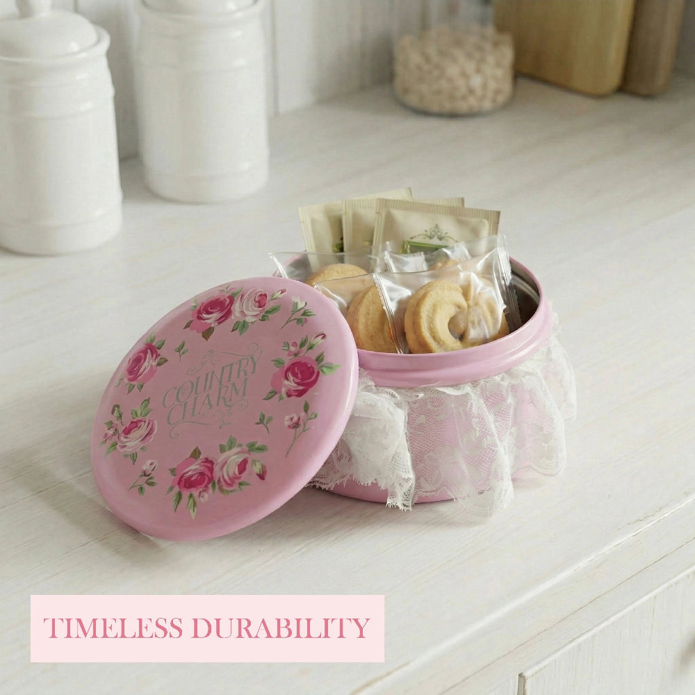 Rosie Tin Jar floral design with tea bags and cookies on white surface
