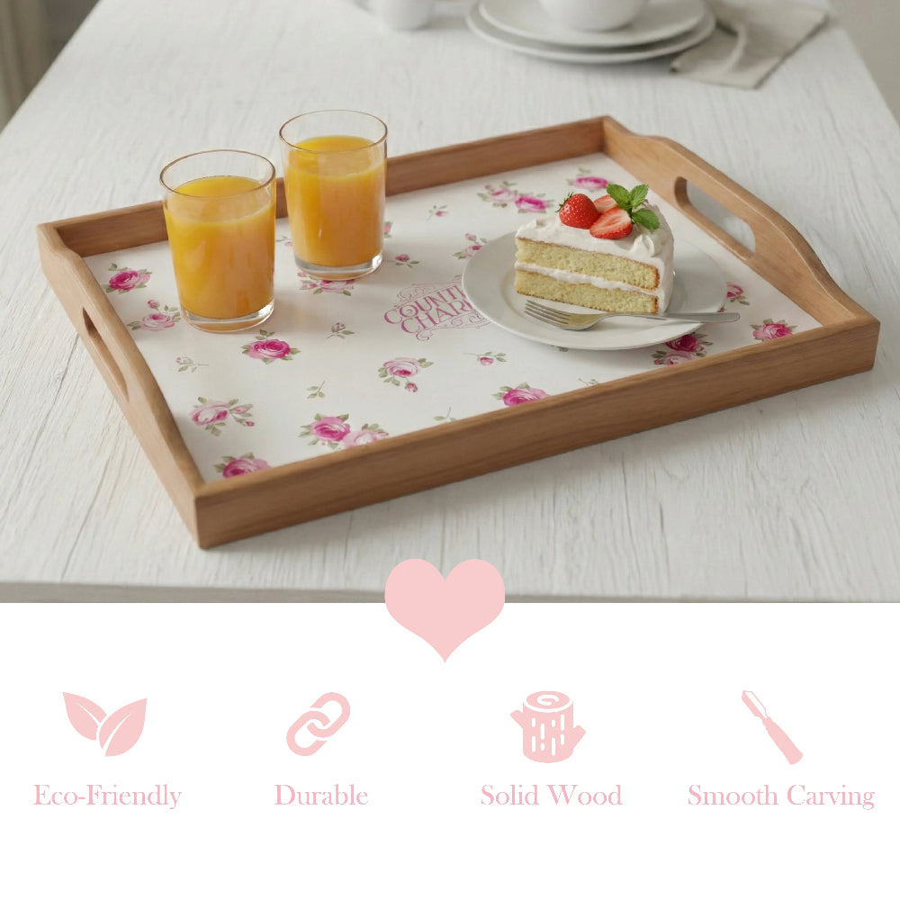 Wooden tray with floral print holding juice and cake, above pink icons for eco-friendly, durable, and solid wood.