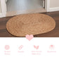 Round braided mat on a wooden floor with product features displayed below.