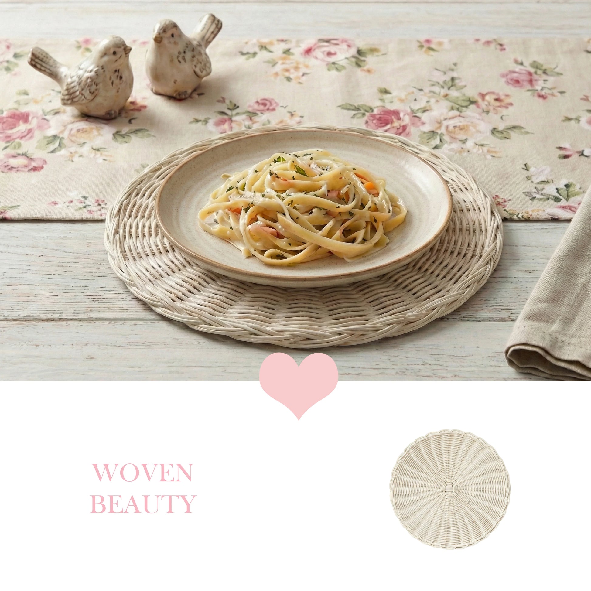Pasta on a white plate atop a wicker placemat, set against a floral runner with bird figurines and pink text.