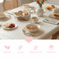 Round Wicker Placemat displayed on a dining table with breakfast setting and decorative table accessories
