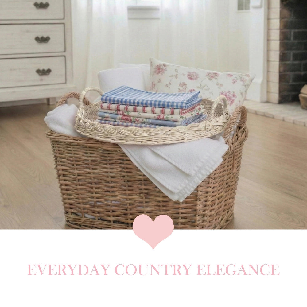 Round Wicker Tray with folded clothes placed on wooden floor showcasing rustic home storage use