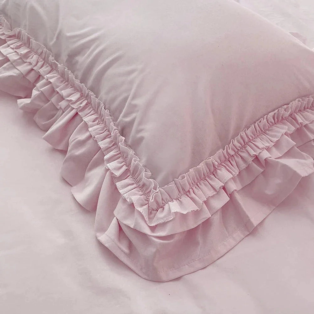 Ruffled Bedding Set pale pink pillowcase close-up highlighting ruffle trim and fabric texture