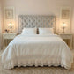 Ruffled Bedding Set white ruffled bedding styled on grey tufted headboard shabby chic bedroom setup