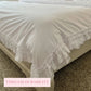 Ruffled Duvet Cover corner detail with timeless durability text overlay