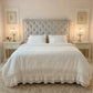 Ruffled Duvet Cover white bedding styled on grey tufted headboard in shabby chic bedroom