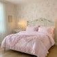 Ruffled Duvet Cover displayed on a wooden bed in a shabby chic bedroom interior