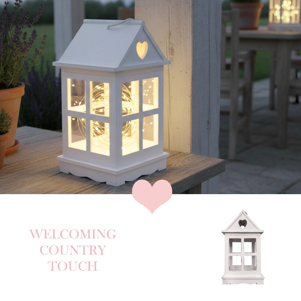 Rustic Wooden Heart Cut-Out Lantern outdoors on wooden surface with plants