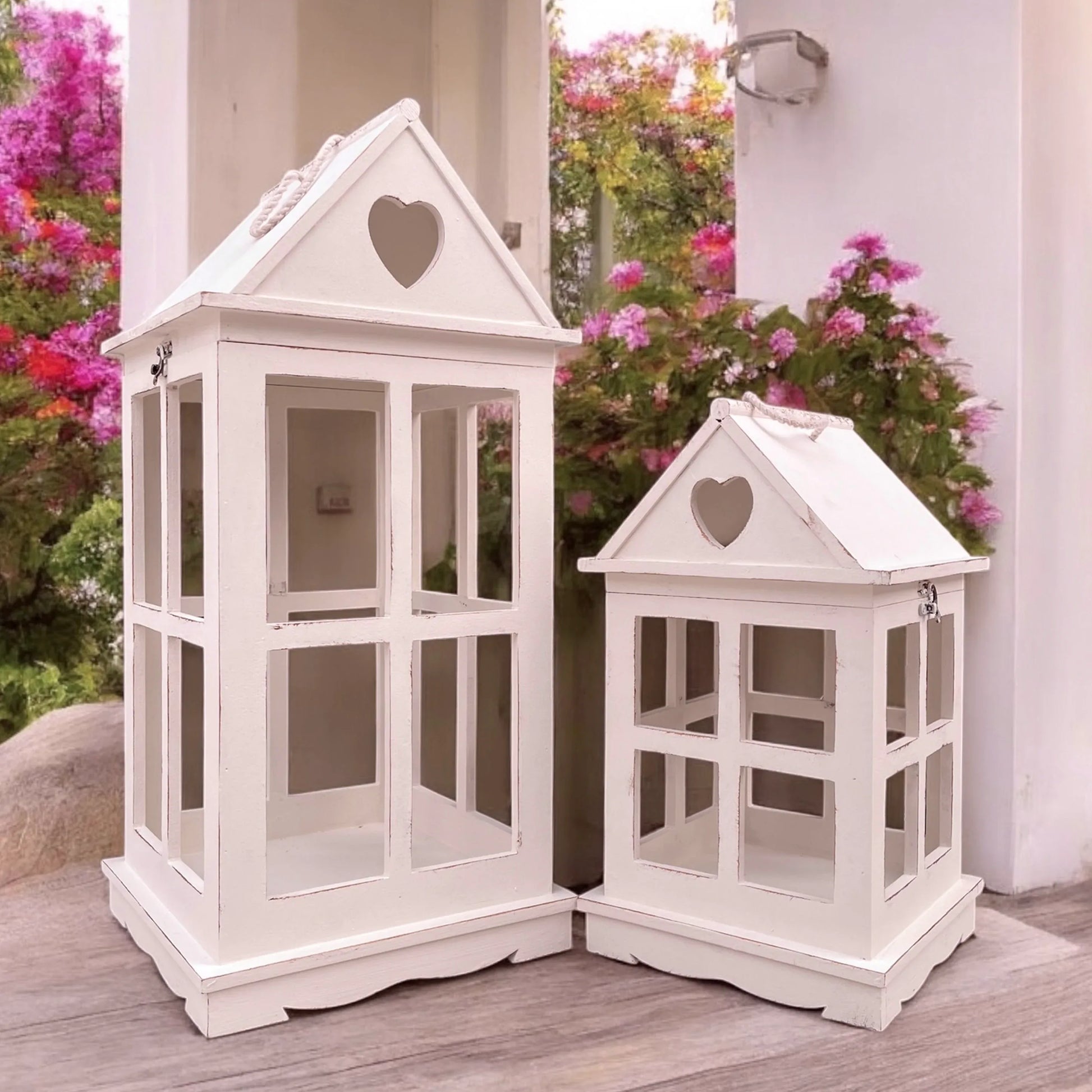 Rustic wooden lantern with heart-shaped cut-outs