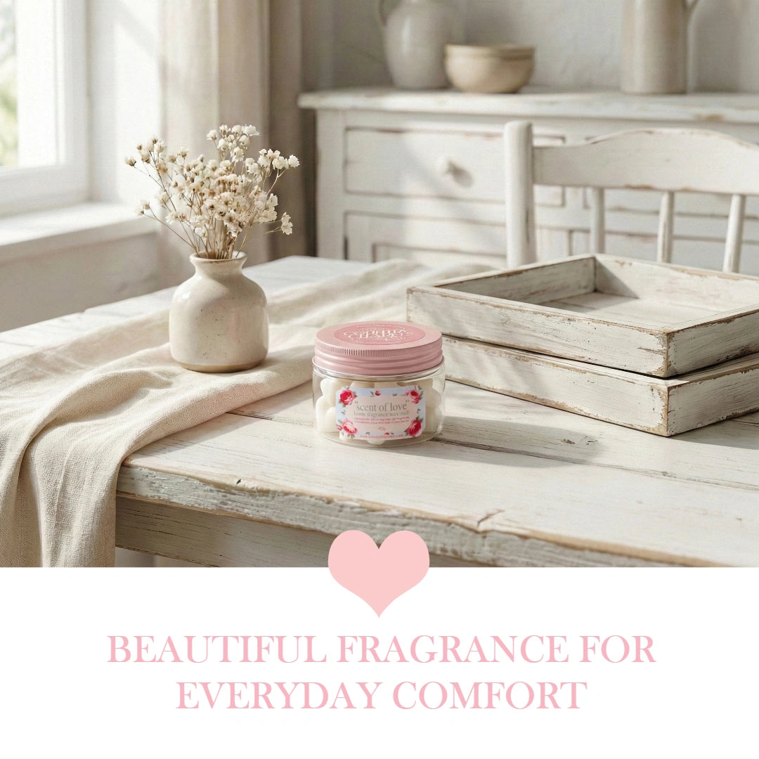 Scent of Love home fragrance soy wax melts jar on a white farmhouse dining table with a wooden tray.