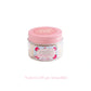 A clear jar with a pink lid containing Scent of Love home fragrance soy wax melts against a white background.
