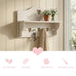 Shabby Chic Heart Cut-Out Wall Shelf with heart hooks displaying decorative items