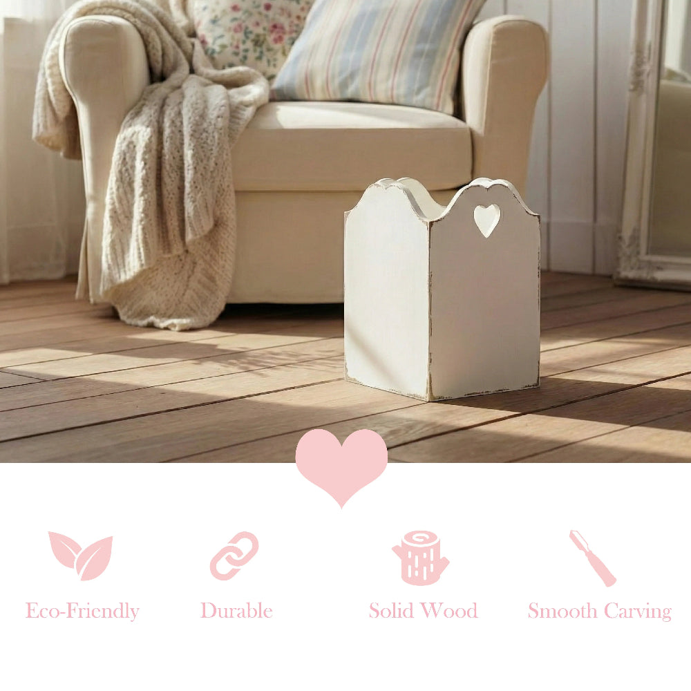 White decorative box with heart cutout on a wooden floor in a cozy living room.