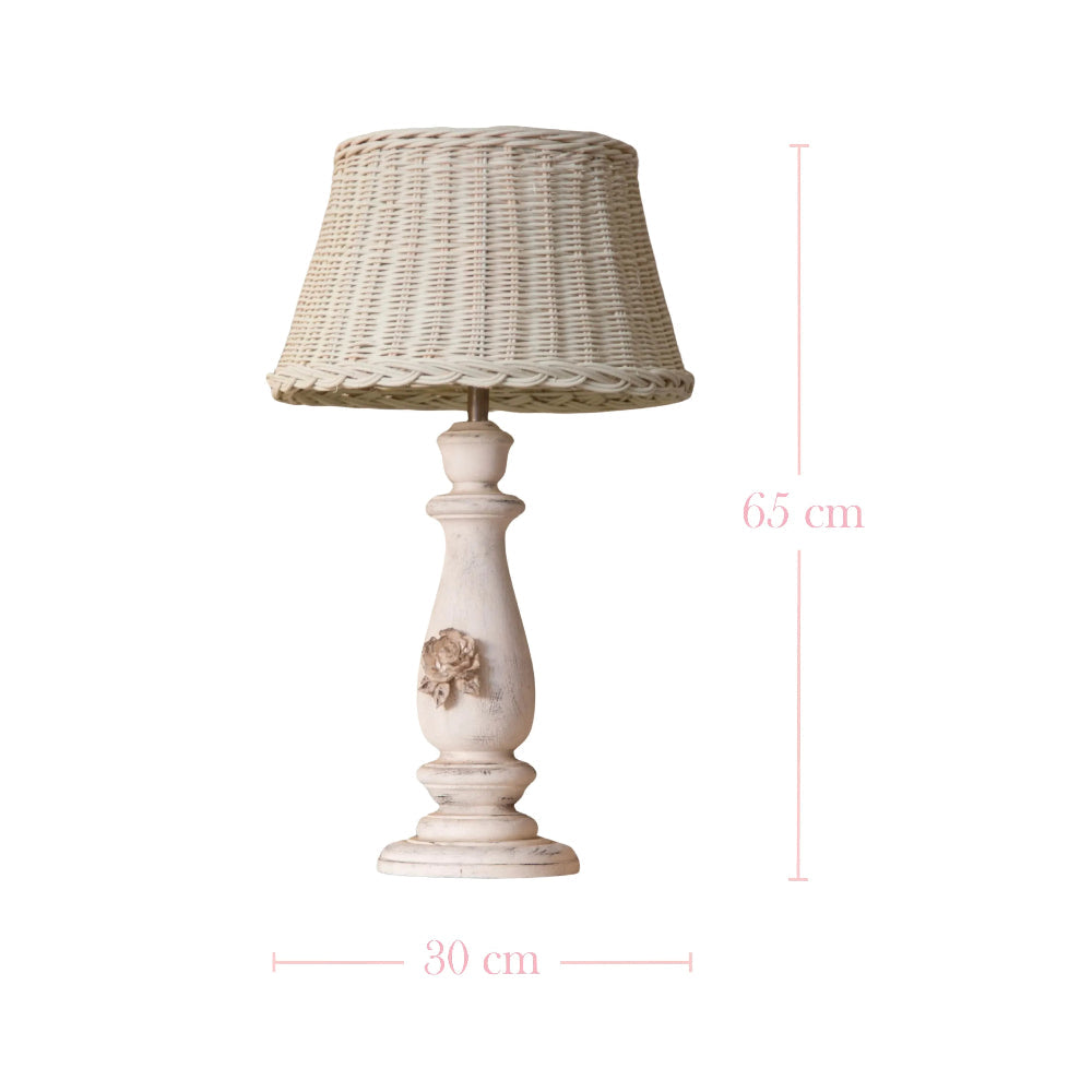 Wicker Shade Side Lamp with wicker shade and decorative base on white background
